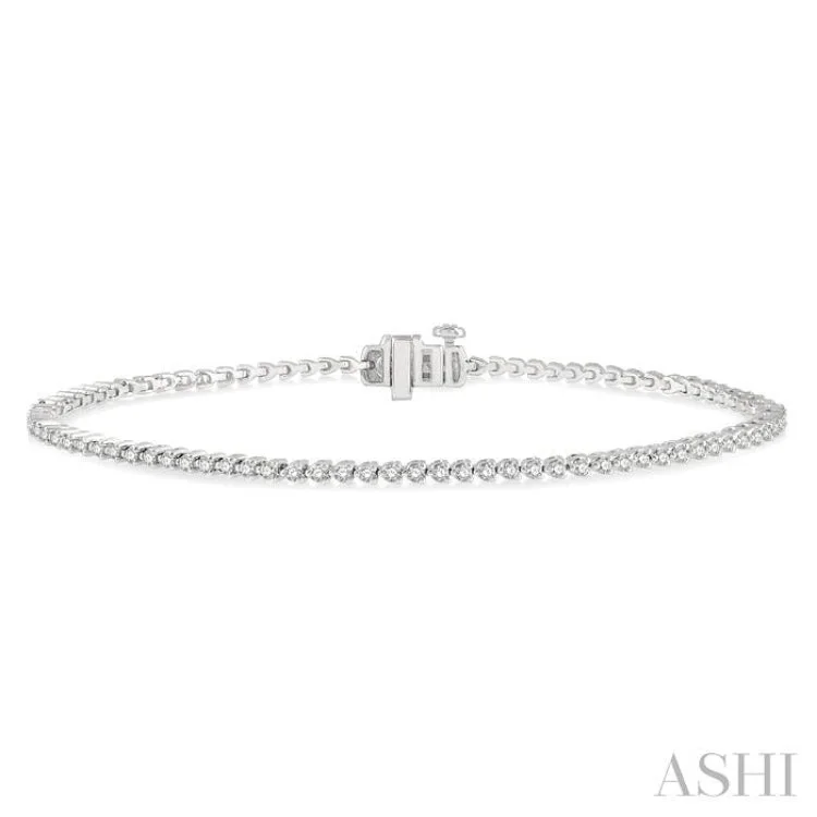 1 Ctw Tri-Prong Round Cut Diamond Tennis Bracelet in 14K White Gold